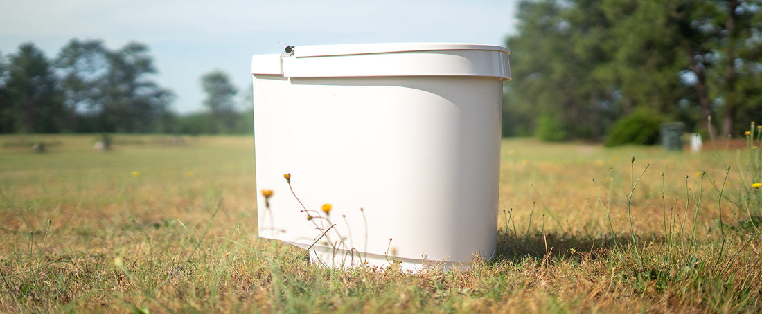 How do I clean my urine-diverting toilet, and what should I keep in mind?